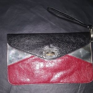 Black, Silver,and Merlot wristlet/clutch.